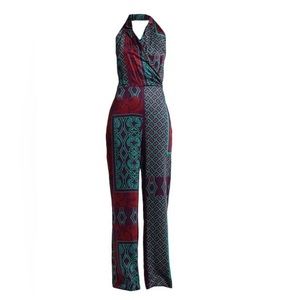 VICOLO
Purple jumpsuit. 100% Viscose